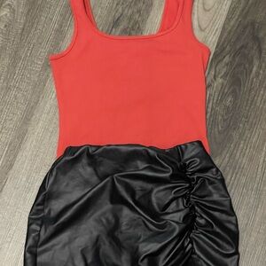 Windsor orange body suit and Windsors black skirt both small